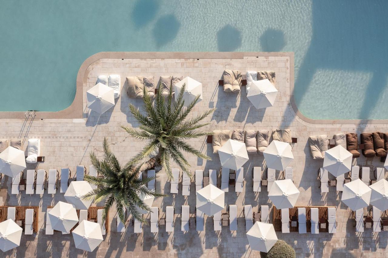Helea Lifestyle Beach Resort Kallithéa Exterior foto Aerial view of the pool at the Westin Dubai