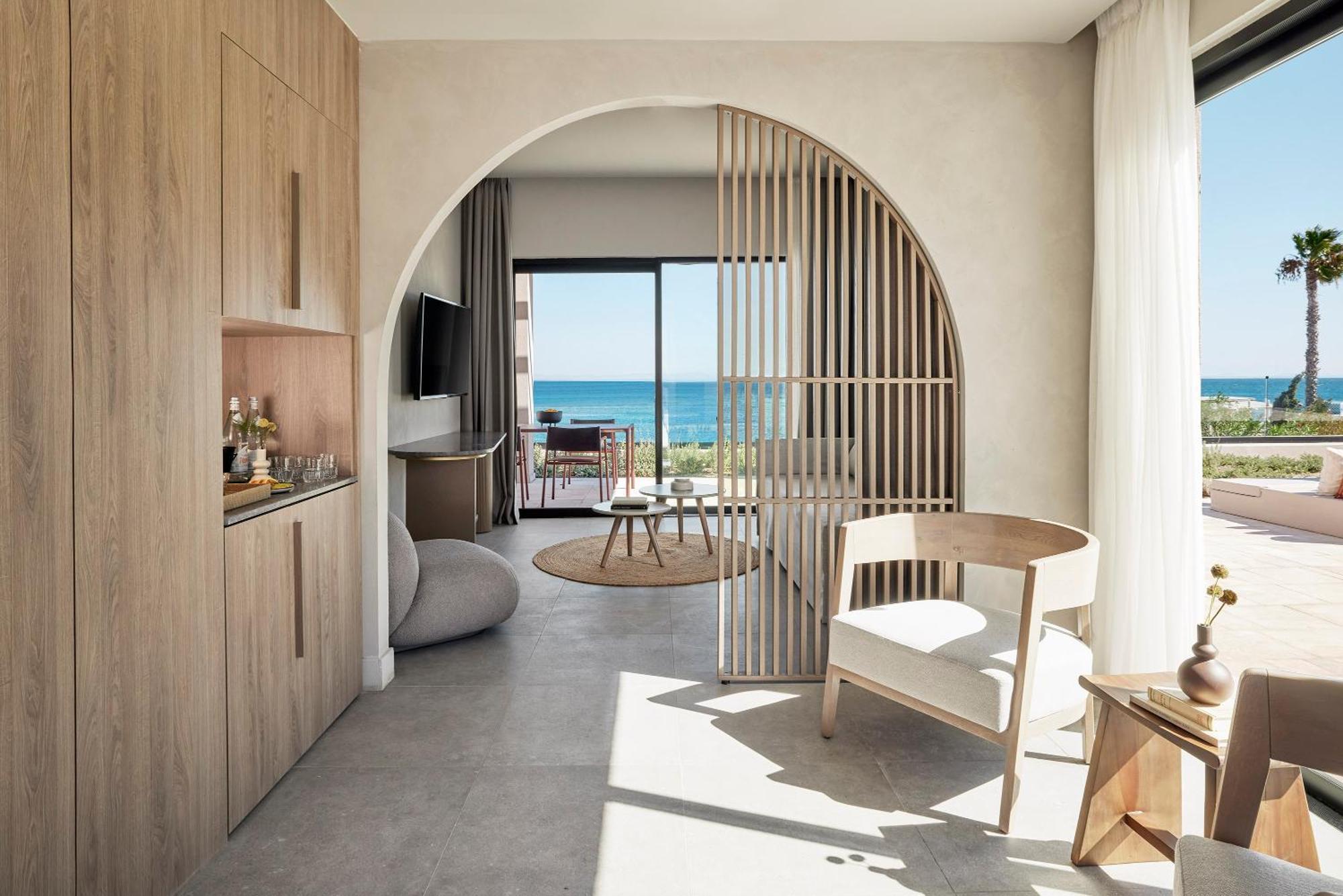 Helea Lifestyle Beach Resort Kallithéa Habitación foto Interior of a suite at the hotel